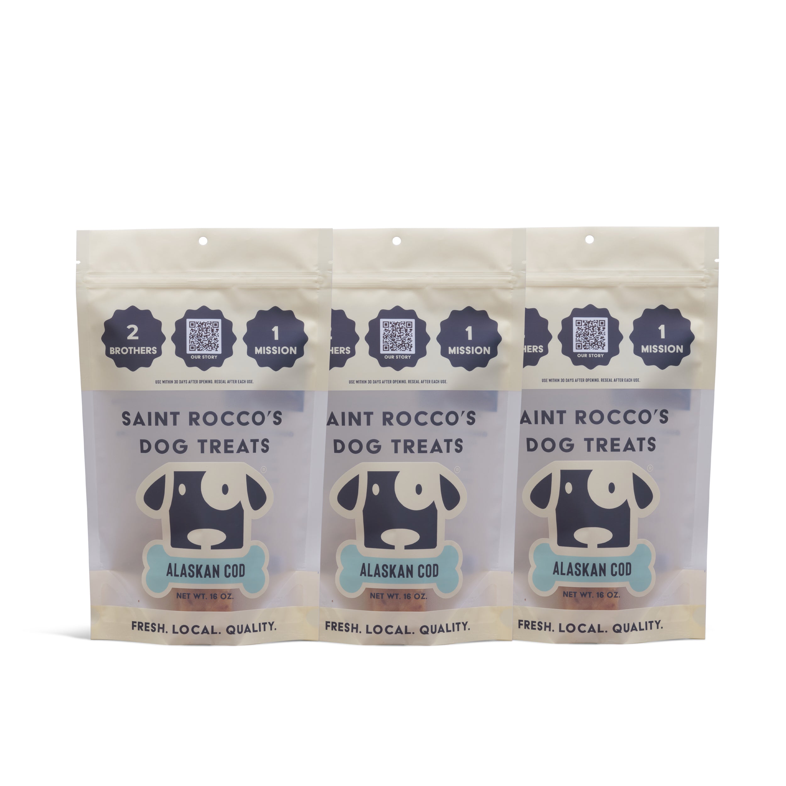 Three packages of Saint Rocco's Dog Treats with Alaskan Cod on a white background
