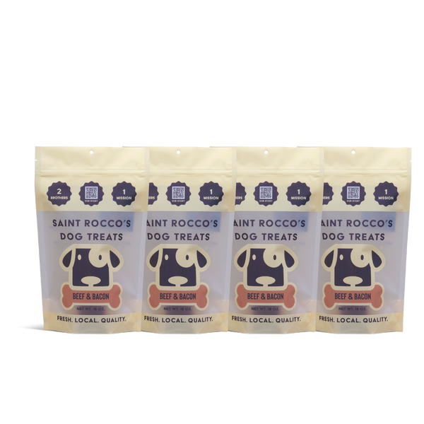 Four packages of Saint Rocco's Dog Treats with beef and bacon flavor on a white background