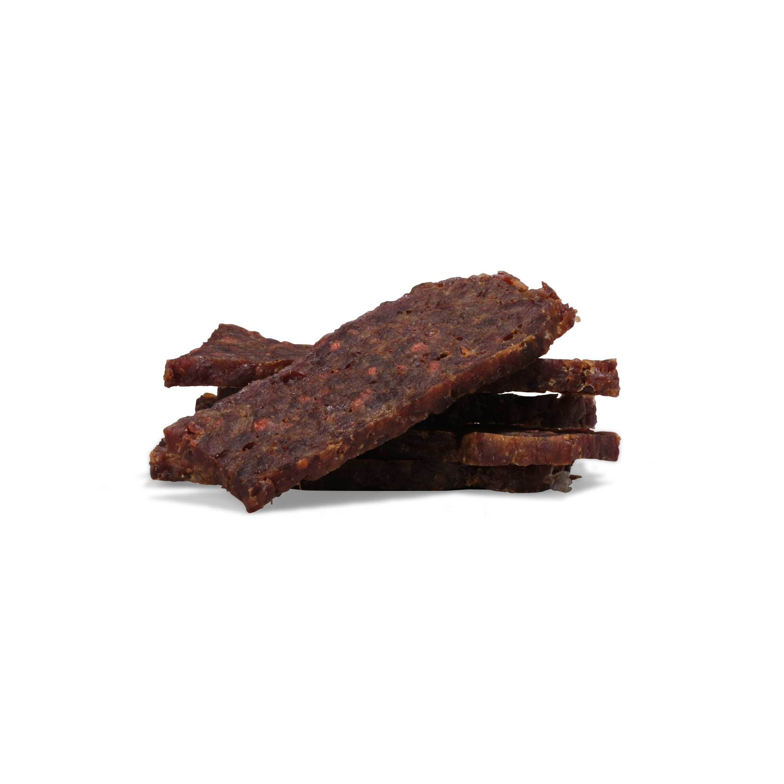 Several pieces of Saint Rocco's Treats Beef Treats Sampler Bundle are stacked on a white background; the dark brown, rectangular jerky has a slightly rough texture.