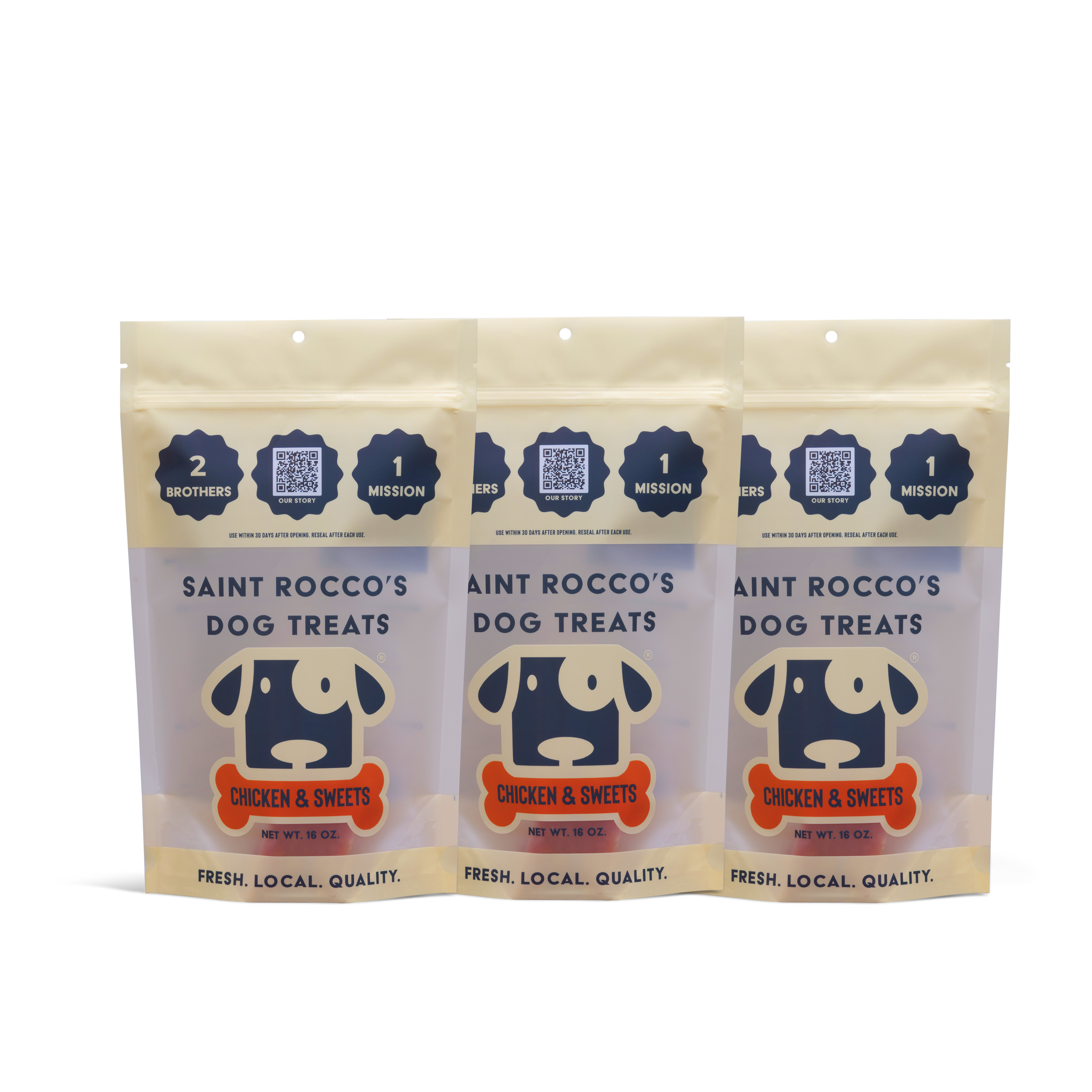 Three beige and light blue bags of Saint Rocco's Treats Chicken and Sweets Treats are displayed side by side, featuring a cartoon dog face and highlighting freshness, local sourcing, and quality.