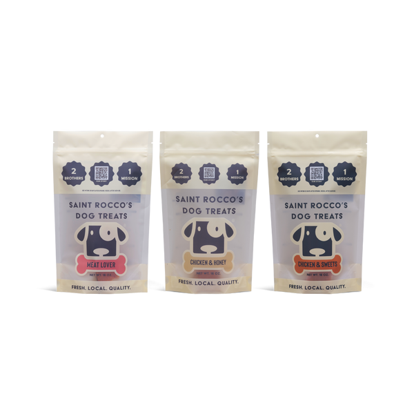 Three packages of Saint Rocco's Dog Treats on a white background