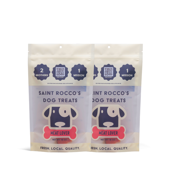 Two packages of Saint Rocco's Dog Treats on a white background