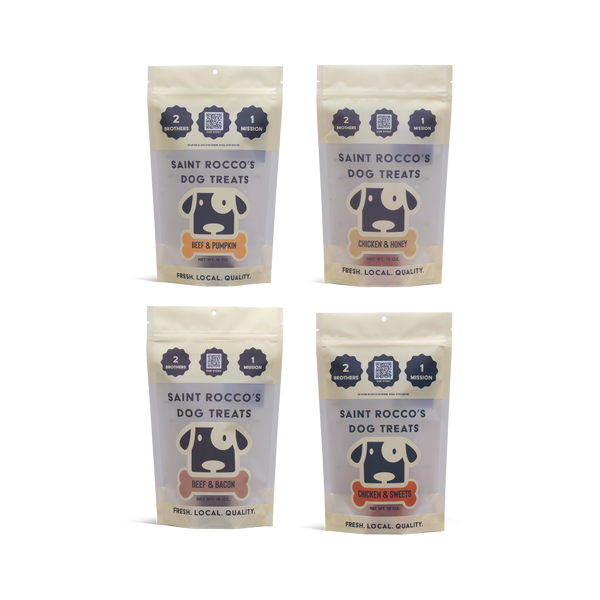 Four packages of Saint Rocco's Dog Treats on a white background