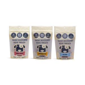 Three packages of Saint Rocco's Dog Treats on a white background