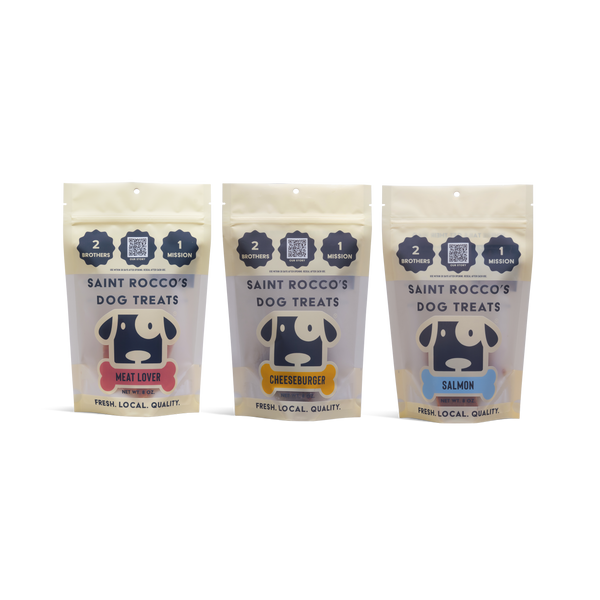 Three packages of Saint Rocco's Dog Treats on a white background