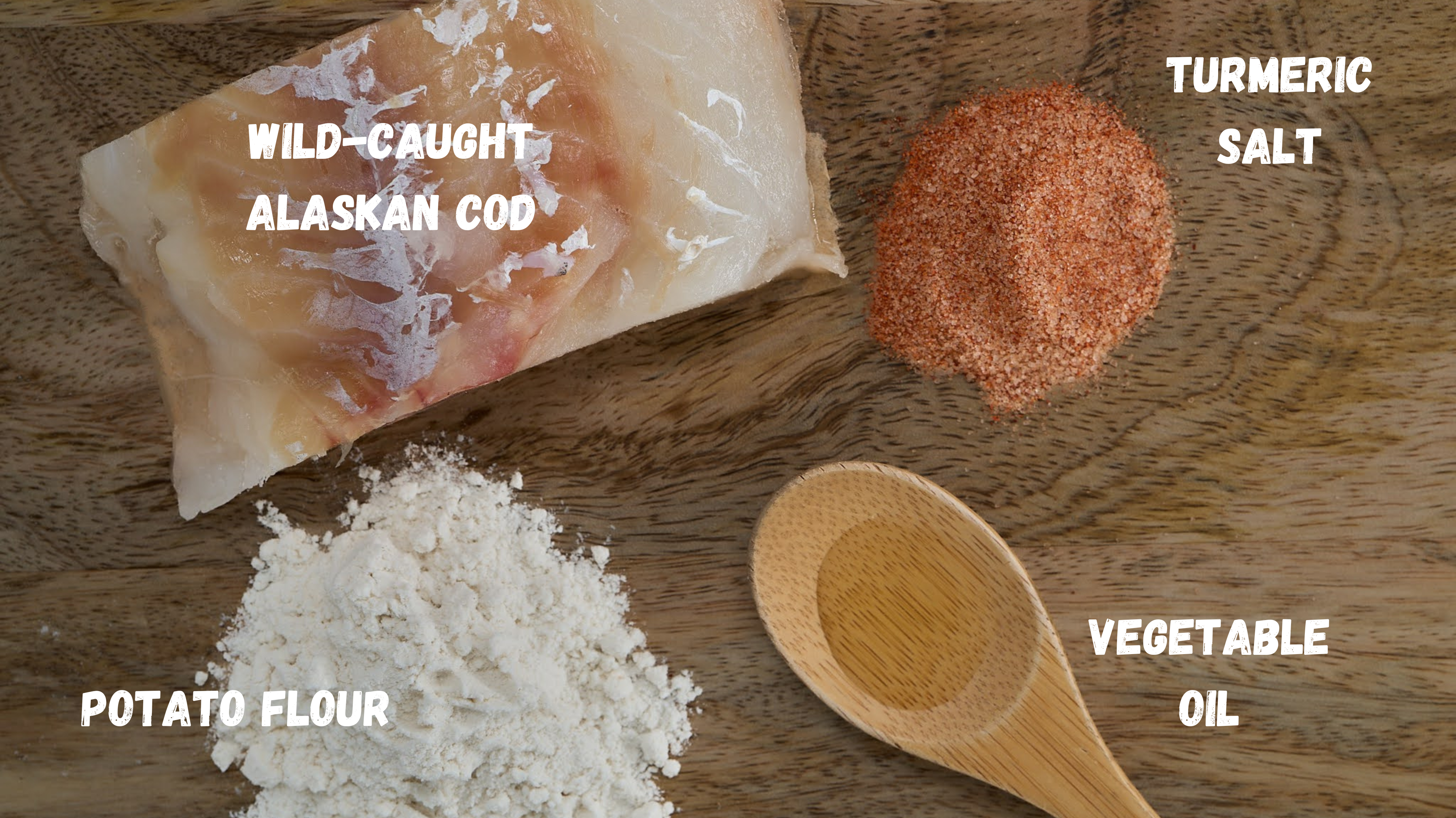 A wooden surface displays ingredients for Saint Rocco's Starter Pack by Saint Rocco's Treats: wild-caught Alaskan cod fillet, potato flour, turmeric salt, vegetable oil in a wooden spoon—all clearly labeled.