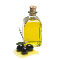 A clear glass bottle of olive oil with a cork stopper sits next to three black olives and an olive branch on a white background. Some oil is spilled near the olives.