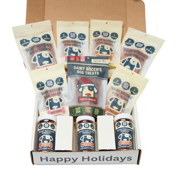 Box of Saint Rocco's Dog Treats with various flavors and a 'Happy Holidays' message.