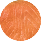 Close-up of a round, orange-colored object with textured surface