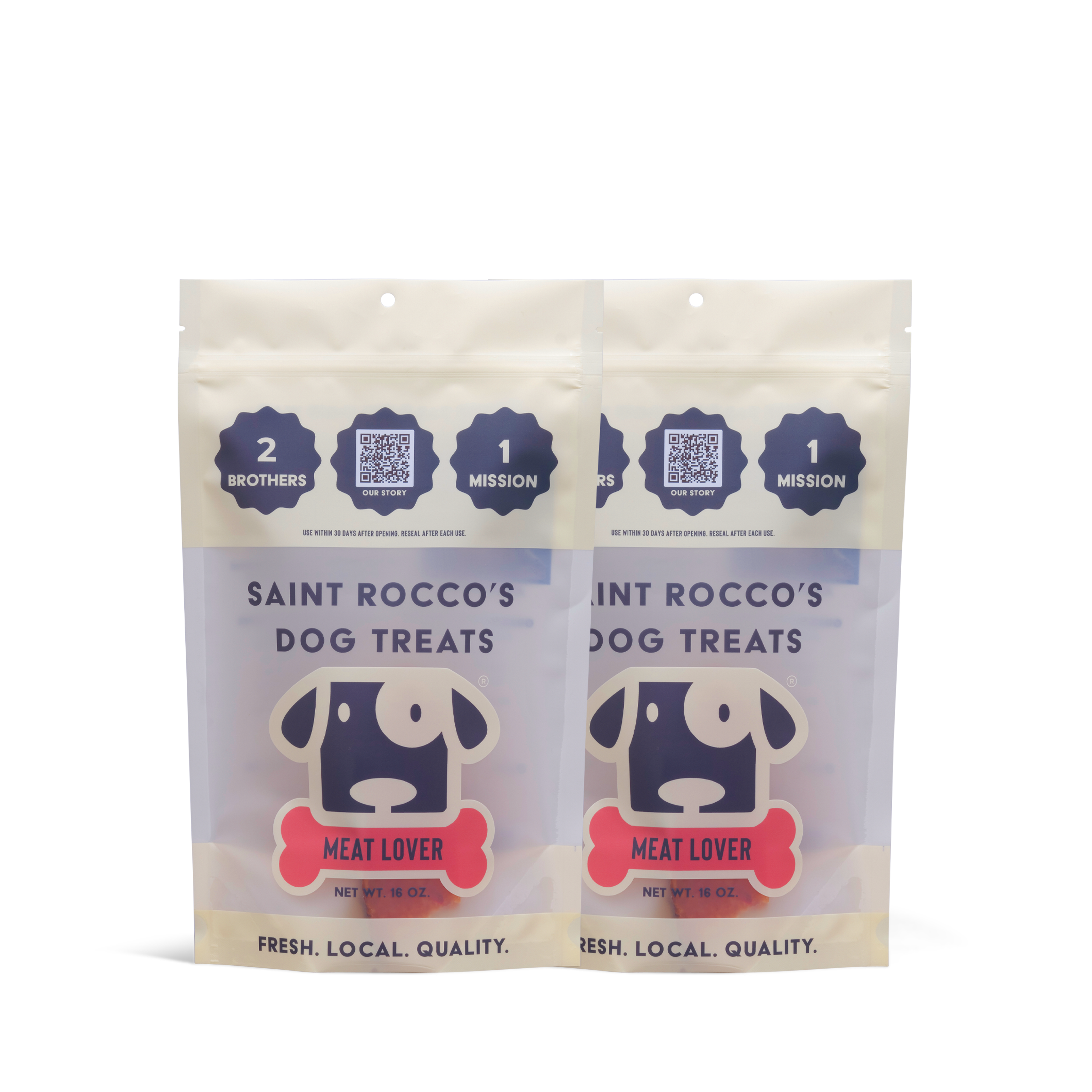 Two bags of Saint Rocco's Treats “Meat Lover Treats” feature a cartoon dog face and red bone, with packaging that reads “2 brothers, 1 mission” and “Fresh. Local. Quality.” at the bottom.