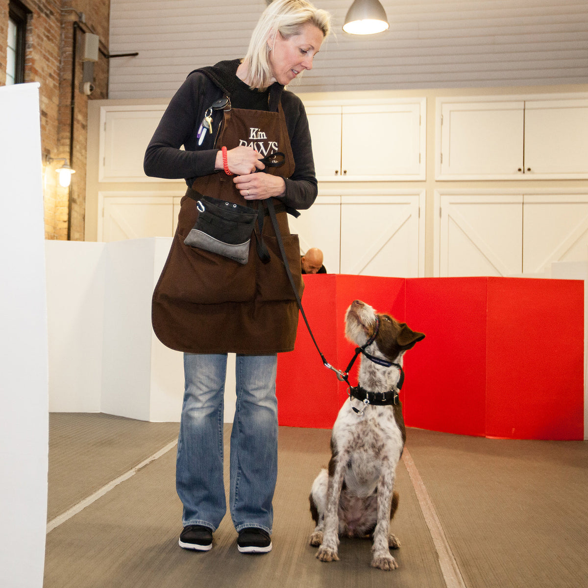 PAWS Trainer helping train a new adopted dog