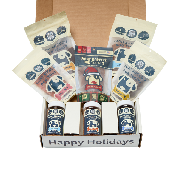 Box of Saint Rocco's dog treats and chews with 'Happy Holidays' text on a white background