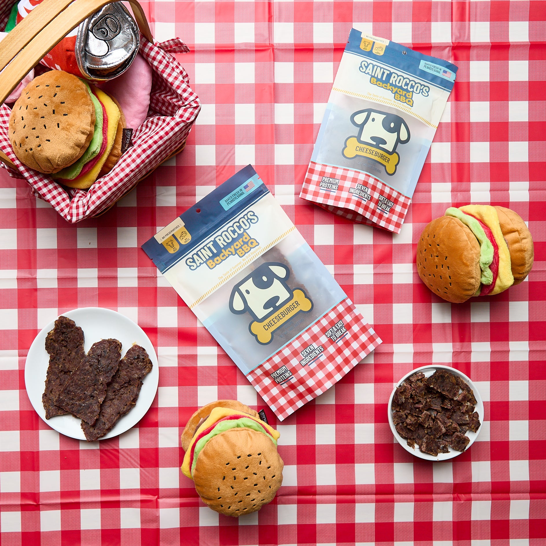 Saint occo's Backyard BBQ limited-edition cheeseburger on a picnic table.