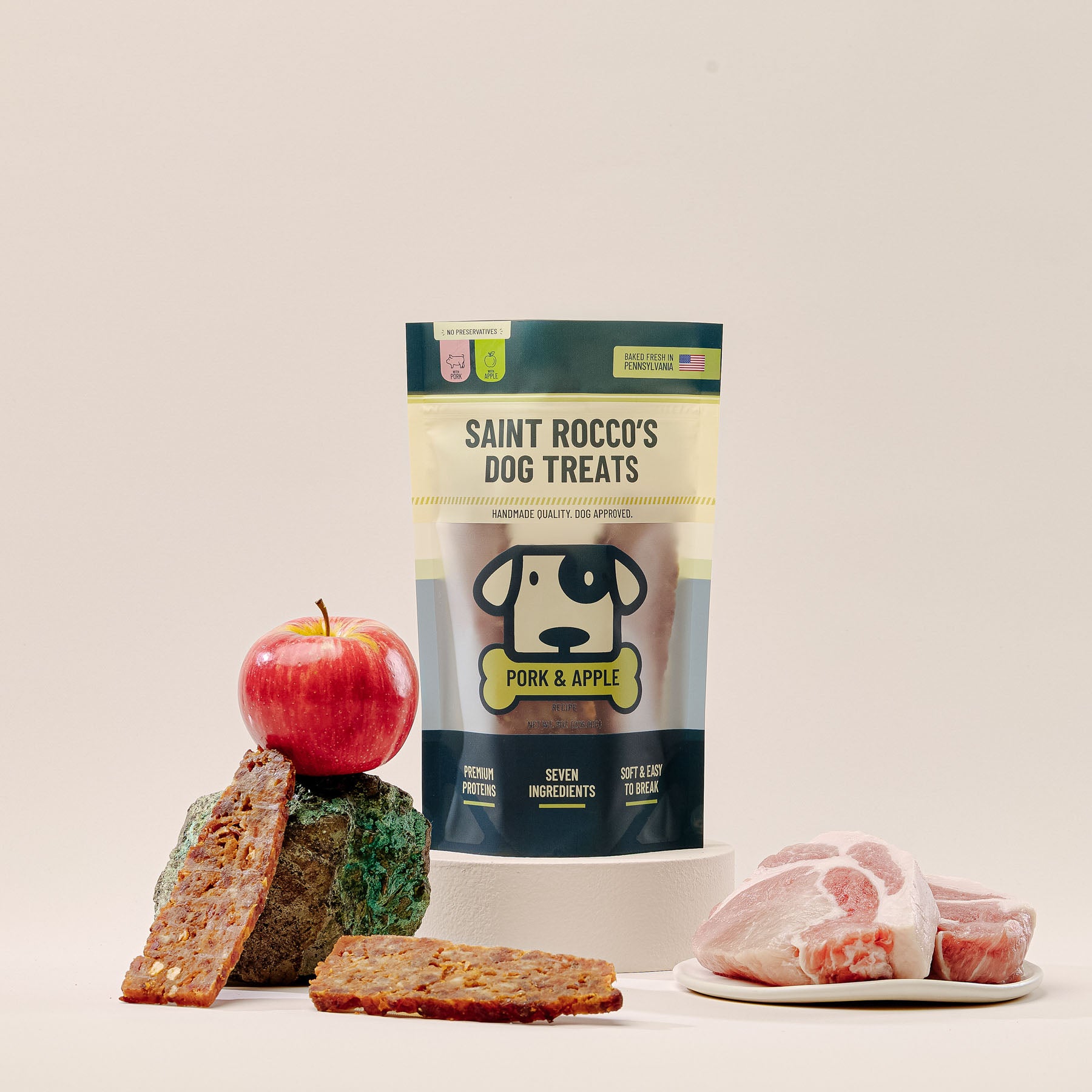 Ingredient shot of pork and apple treat.