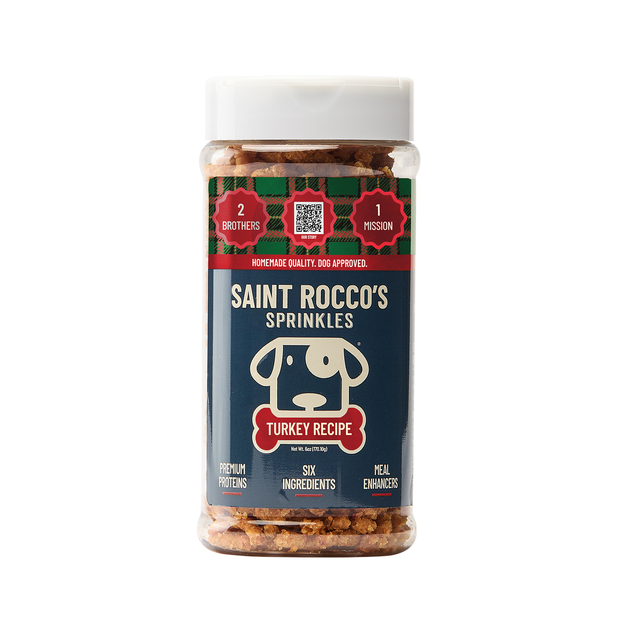 A clear plastic bottle of Saint Rocco's Sprinkles dog treats meant as enrichment or meal toppers, showing the turkey sprinkles inside, with a white cap and a navy blue label featuring a dog logo and red plaid accents.
