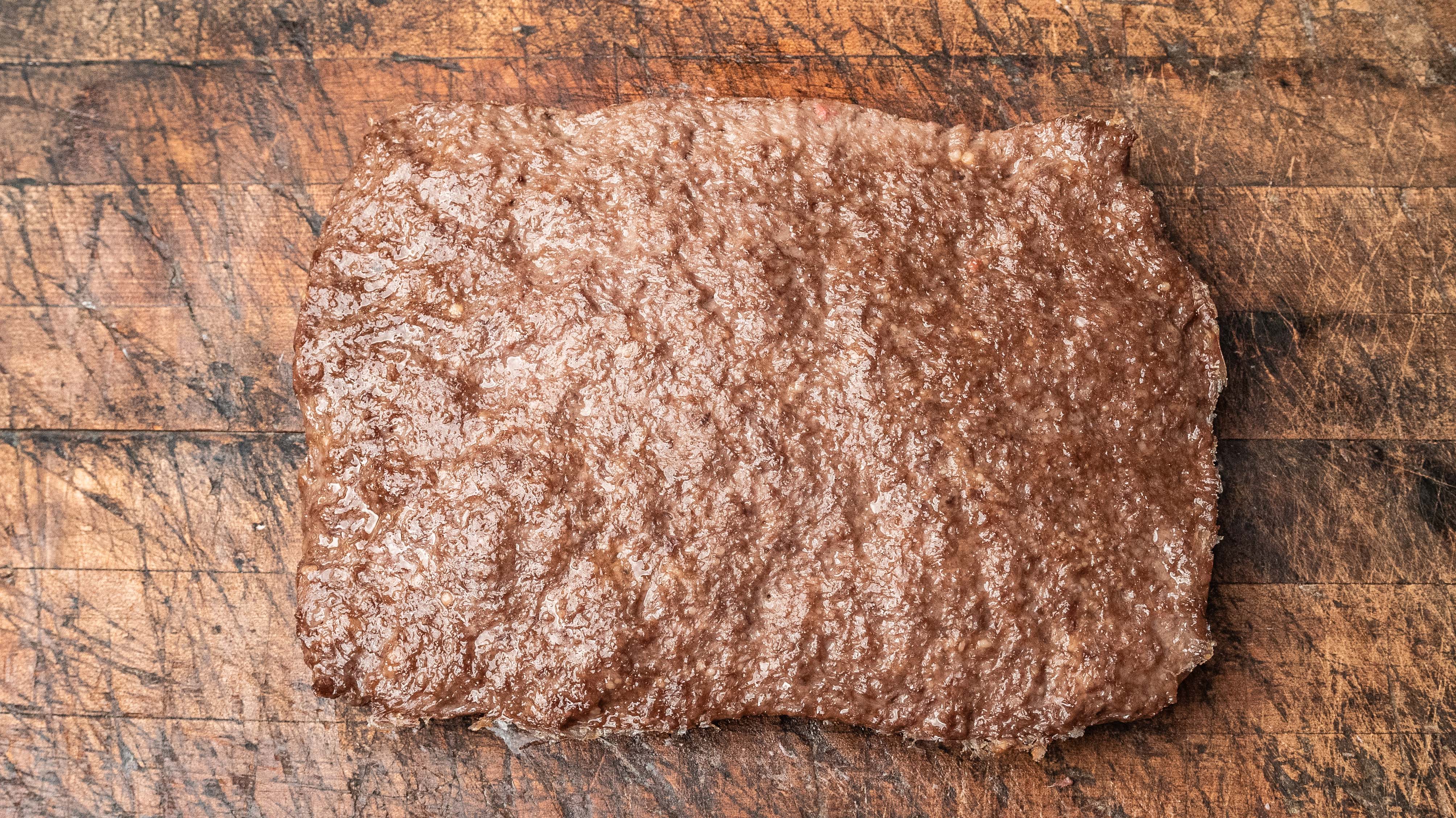 saint roccos cooked meat loaf on a butchers table