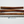 Load image into Gallery viewer, Three Bully sticks of different lengths on a white background with a ruler for scale, branded 'Saint Rocco's Treats'.
